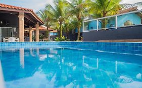 Casa com piscina aquecida, Condomínio a beira mar